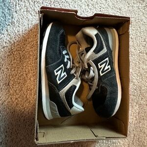 Boys New Balance 574 navy blue. Size 10